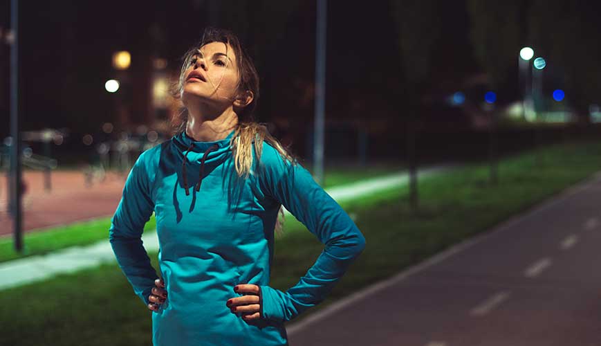 Woman Running at Night